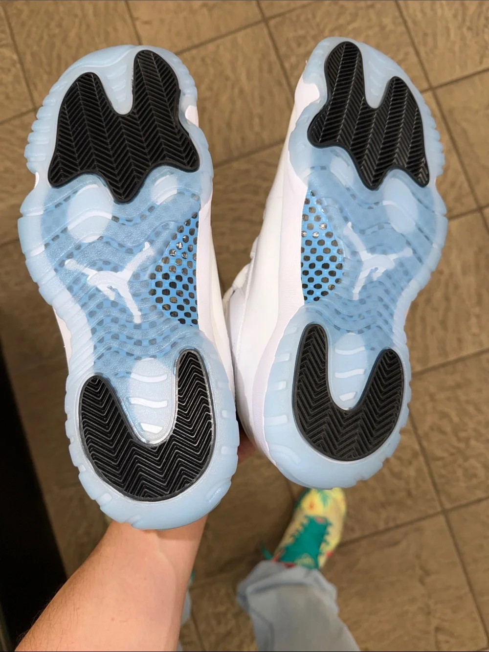 Jordan 11 Legend Blues Sneakers in White with Light Blue Accents